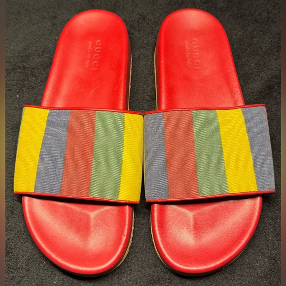 Gucci red sandals with multi colored foot strap. Used in good condition.